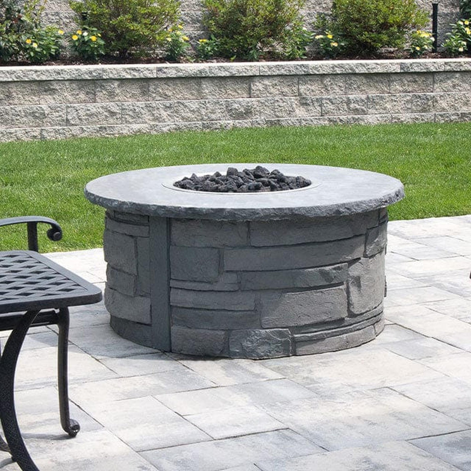 Nicolock 44" Ovation Round Deluxe AWS Liquid Propane Package with Surround in Ledgestone Texture & Bluestone Color