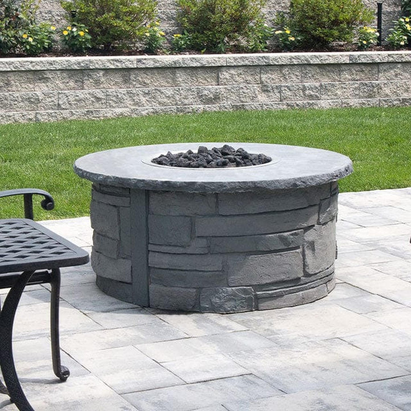 Nicolock 44" Ovation Round Deluxe TPSI Liquid Propane Package with Surround in Stackstone Texture & Bluestone Color